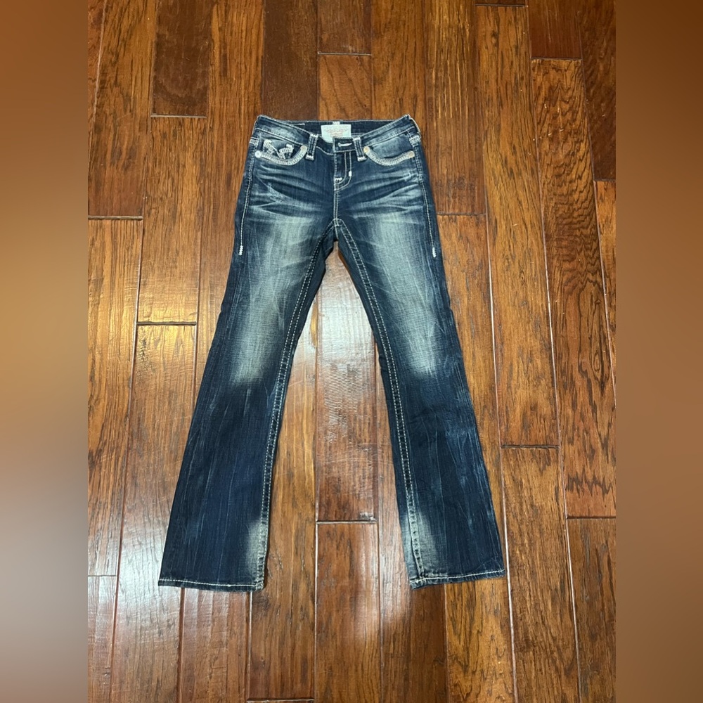 Mid rise boot cut jeans size 25